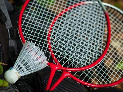 Close-up of professional fitness equipment on a white floor.